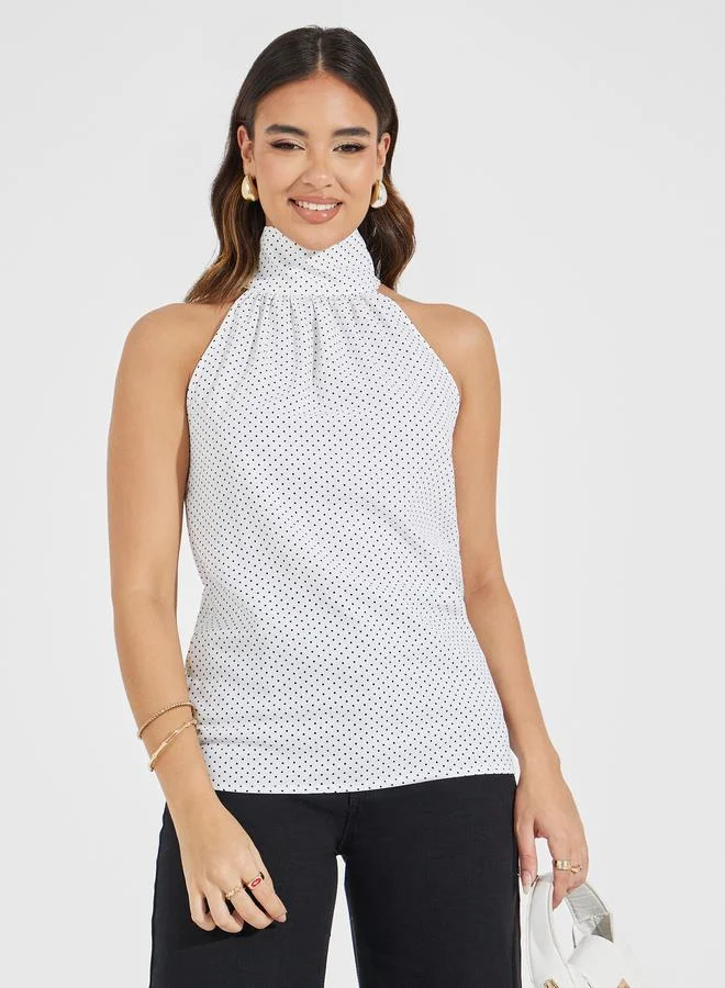 Styli Polka Print Halter Neck Top with Bow Tie Detail