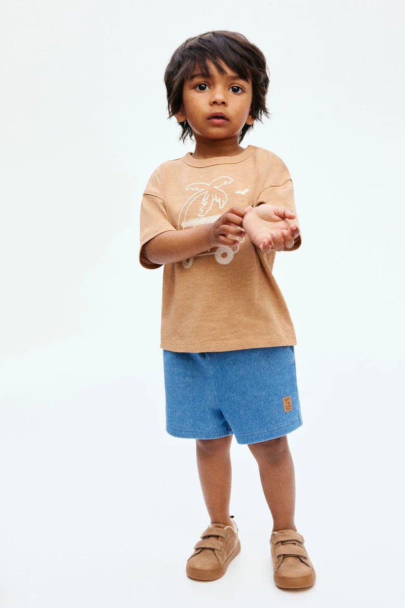 اتش اند ام تي-شيرت بتصميم مطبوع