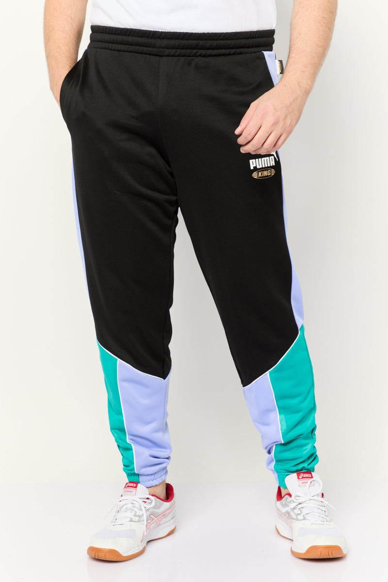 PUMA Men Sportswear Fit Outdoor Sweatpants, Black - Image 1