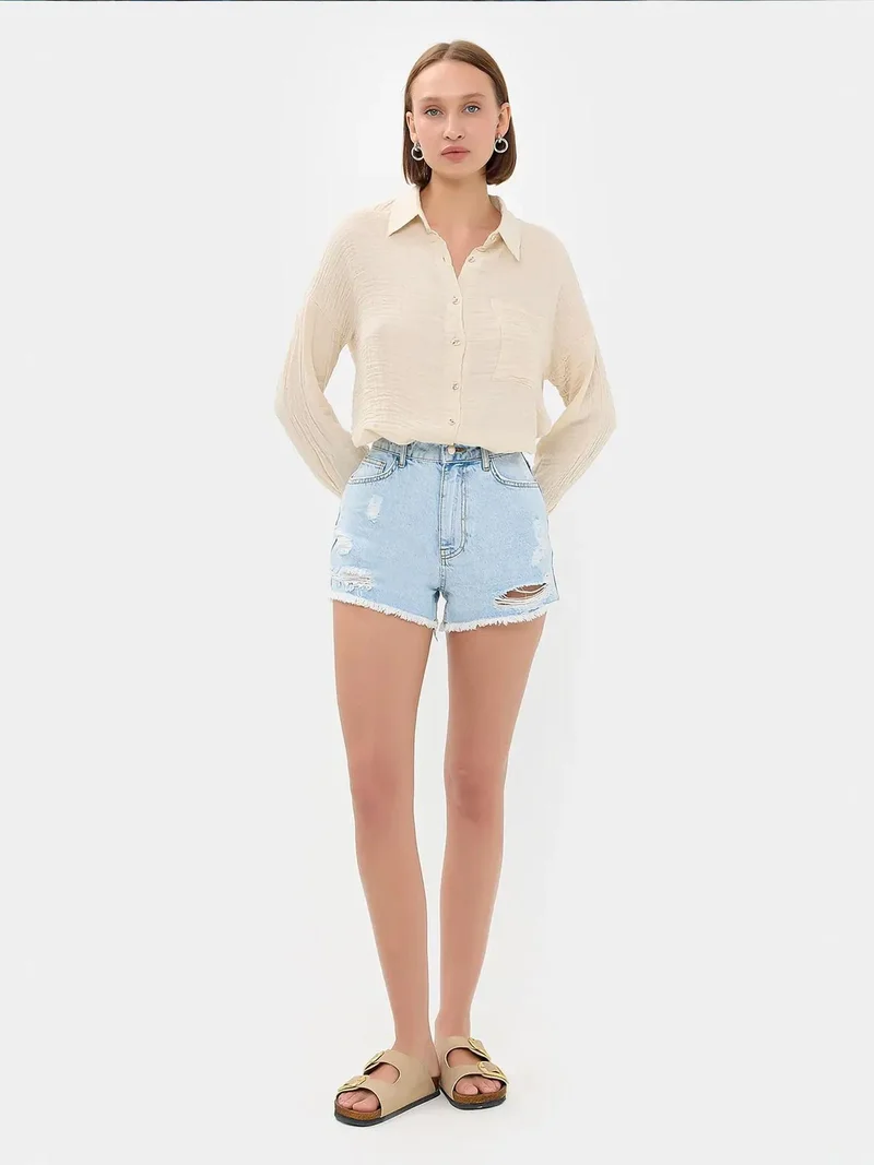 زوبعة قميص فضفاض بجيوب