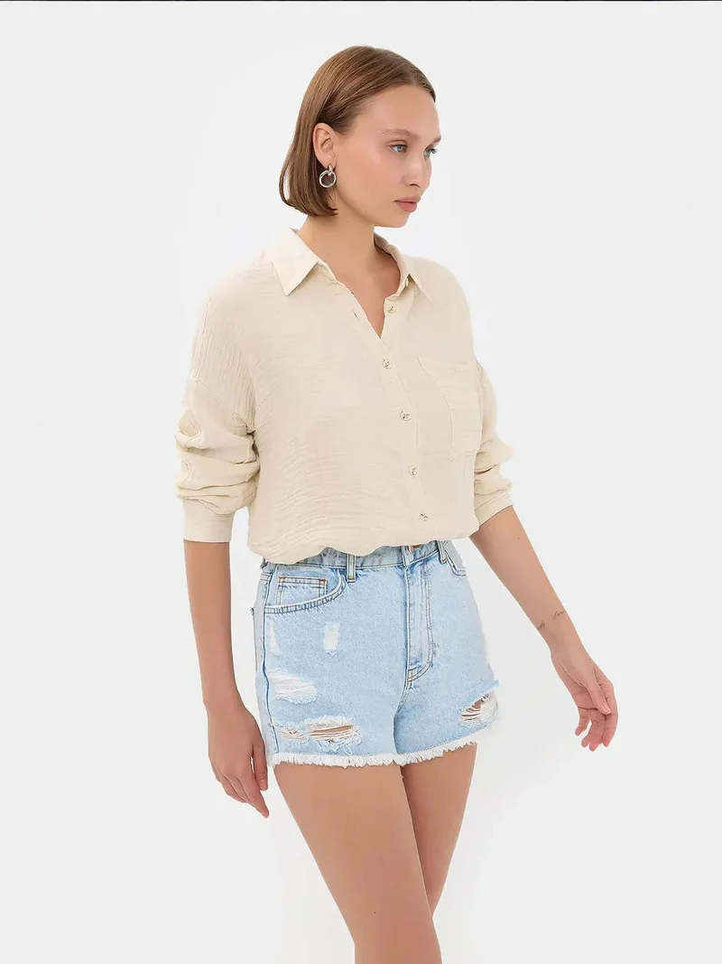 زوبعة قميص فضفاض بجيوب
