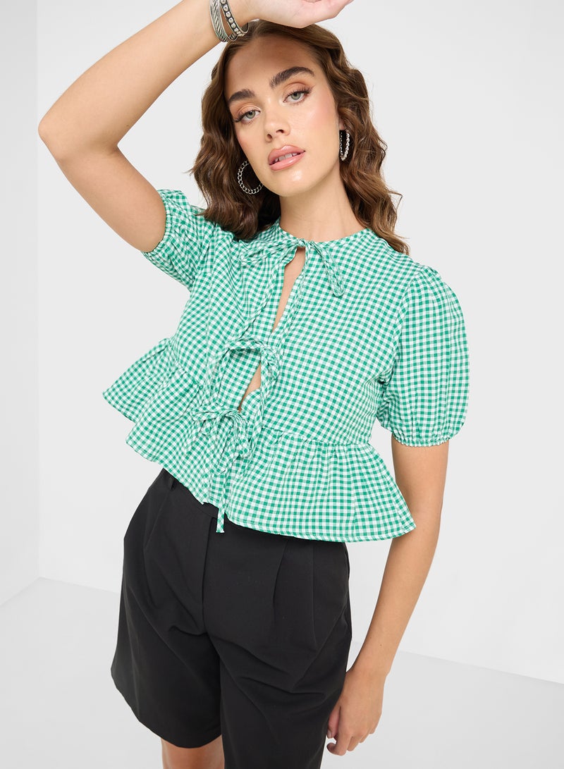 جينجر بلوزة بيبلوم بتفاصيل ربطة منقوشة بالجينغهام - Image 1