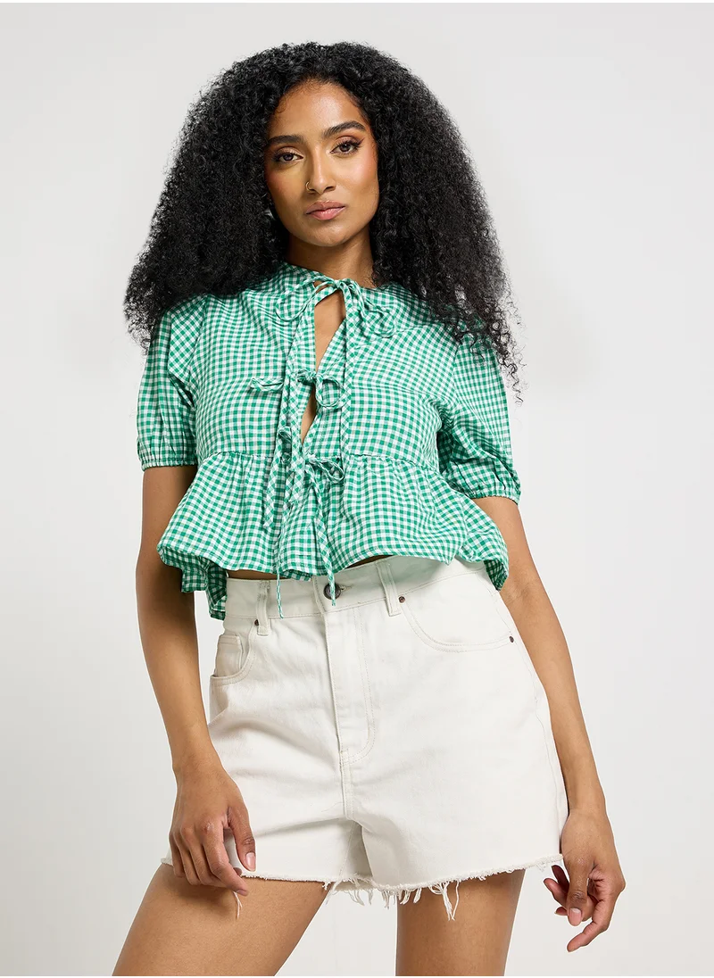 جينجر Gingham Tie Up Detail Peplum Blouse