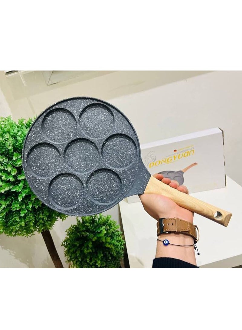 7-in-1 mini grill for a unique cooking experience - accommodates a variety of delicious preparations, from qatayef to eggs and pancakes. Made of high-quality granite for optimal heat distribution. - Image 1