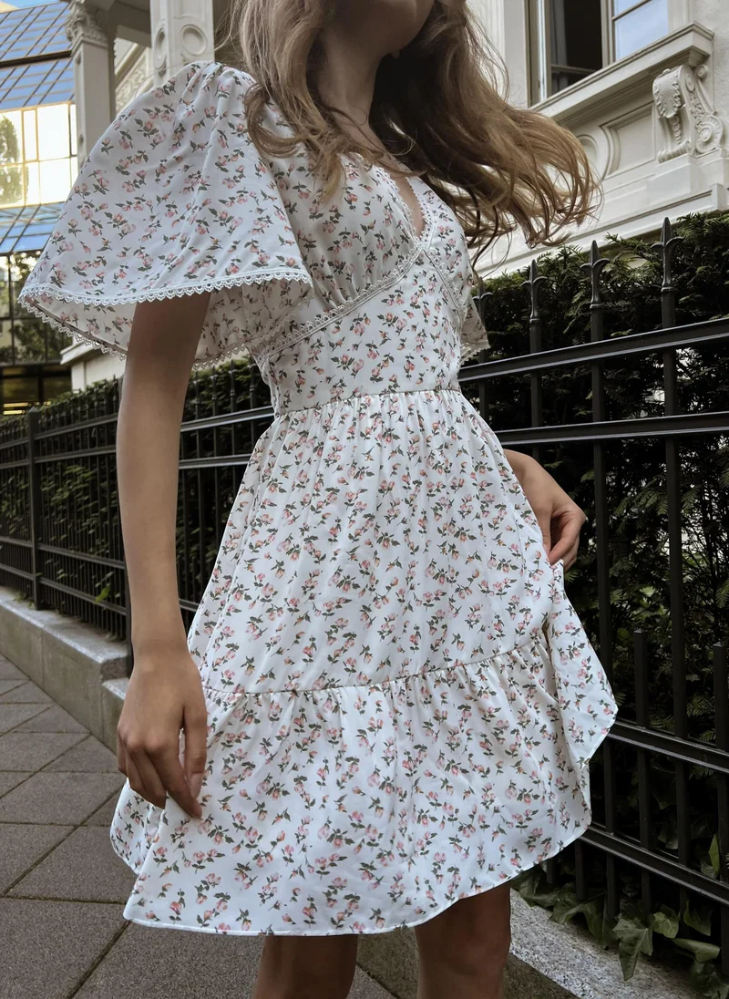 Lichi  Mini dress trimmed with broderie anglaise for Women | Best Price UAE