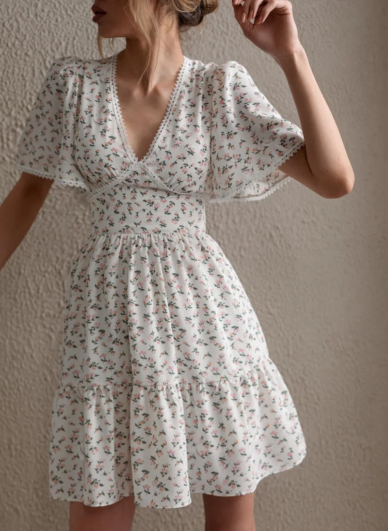 Lichi Mini dress trimmed with broderie anglaise