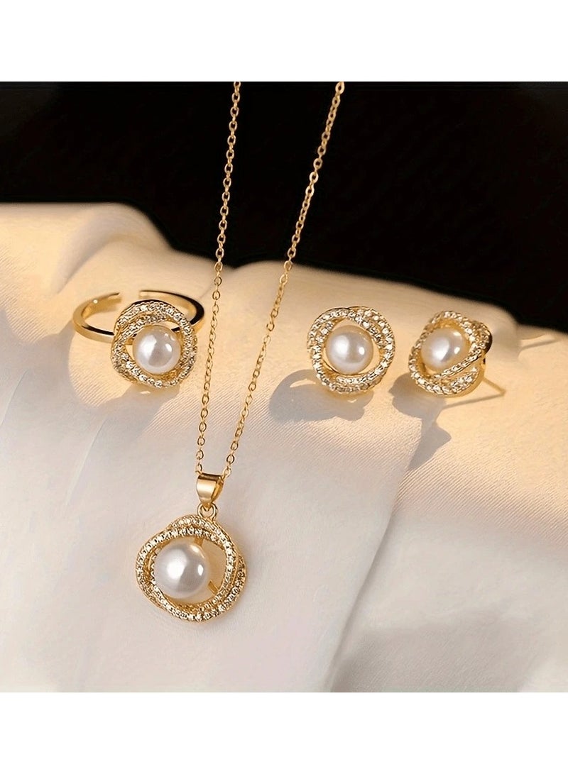 اكسسوار نسائي طقم يحتوي على سلسال ، اقراط و خاتم باللون الذهبي  مرصع باحجار الراين اللامعه و بتصميم لؤلؤ - Image 1