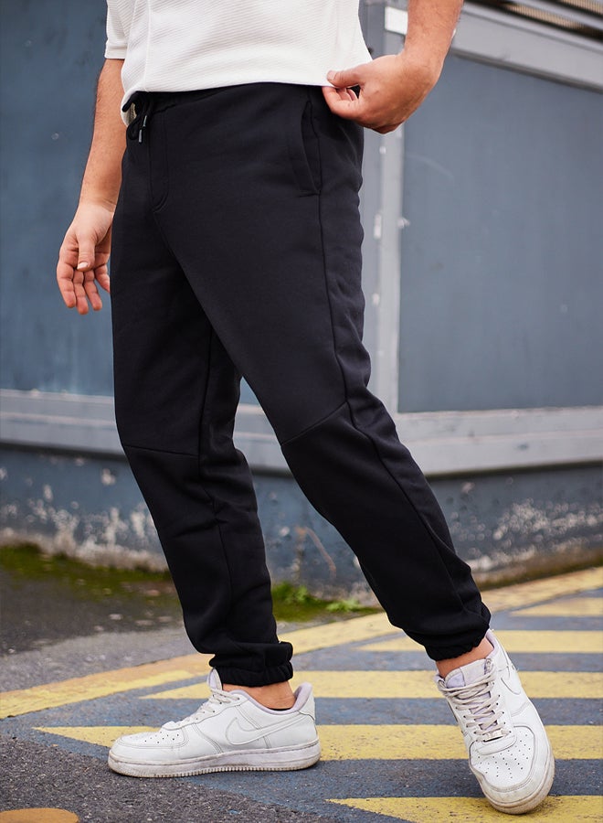 Black Regular Cut Text Print Detailed Sweatpants TMNAW25EA00003