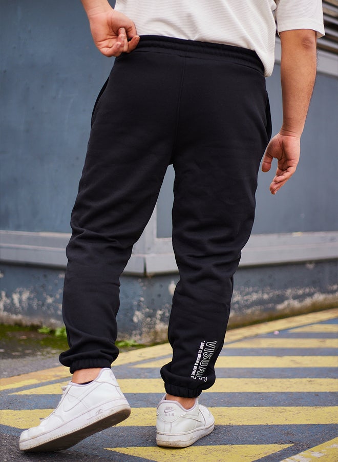 Black Regular Cut Text Print Detailed Sweatpants TMNAW25EA00003