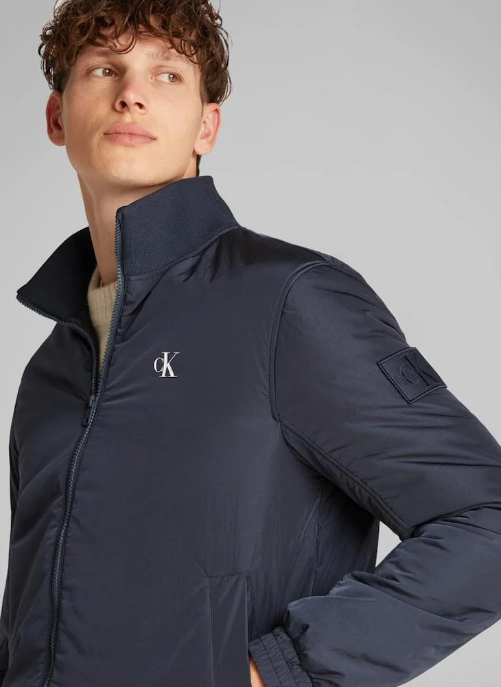 Calvin Klein Jeans Logo Print Zip Through Padded Harrington Jacket