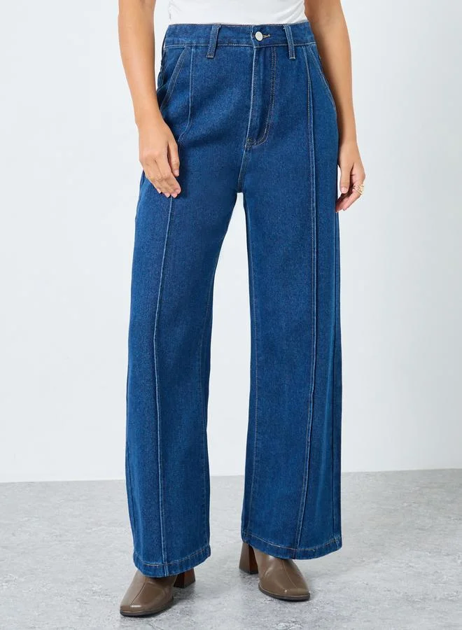 ستايلي جينز بأرجل واسعة وخصر عالي مع درزات