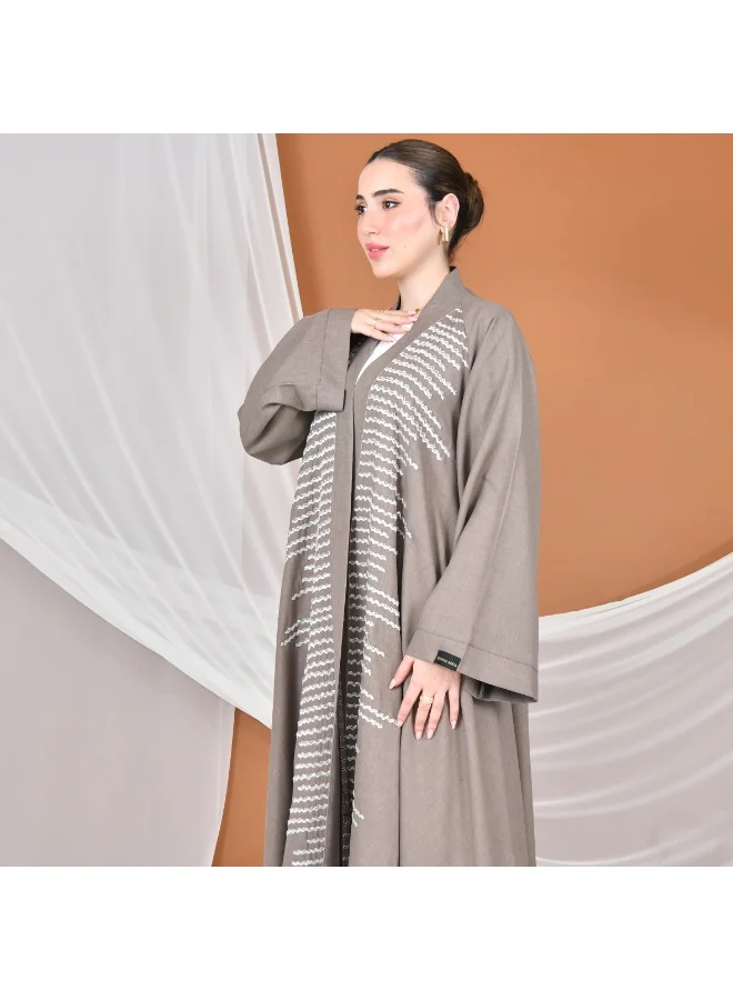 عبايات حوراء عباية لف نص كلوش بكم واسع مزينة بشك وتطريز