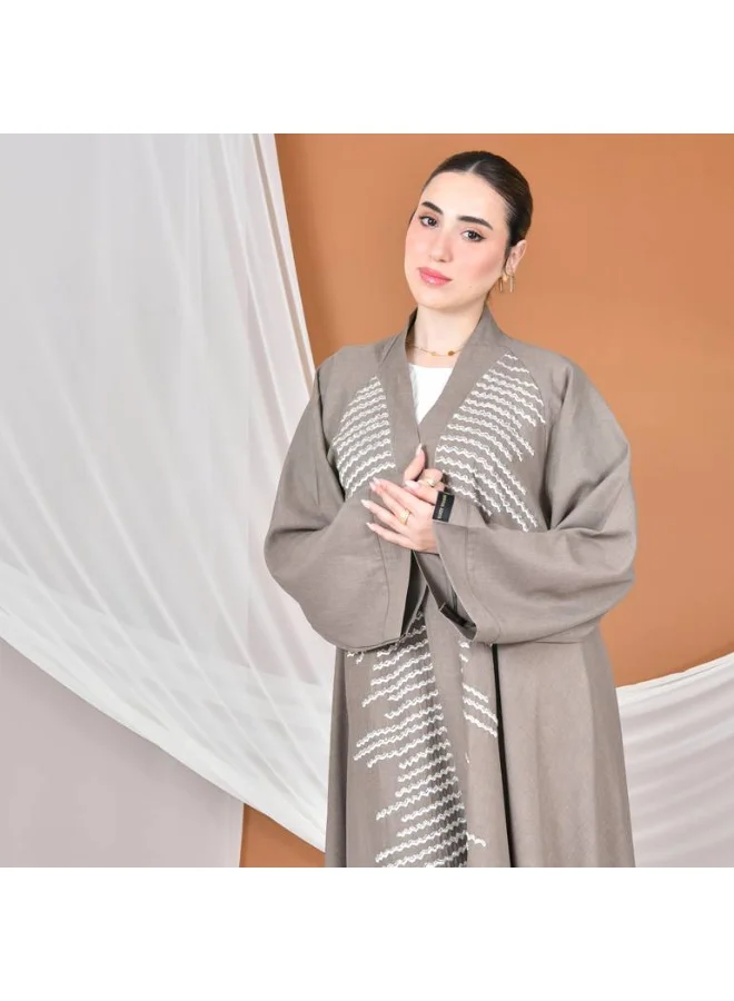 عبايات حوراء عباية لف نص كلوش بكم واسع مزينة بشك وتطريز