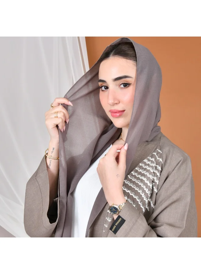 عبايات حوراء عباية لف نص كلوش بكم واسع مزينة بشك وتطريز