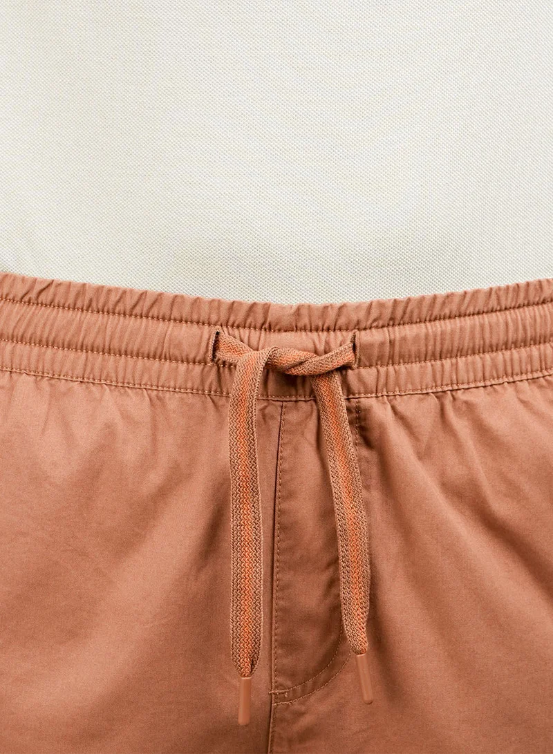 GIORDANO  Men's Cotton Twill Bermuda Shorts: Slim Fit, Elastic Waist, Ultimate Comfort for Men | Best Price UAE