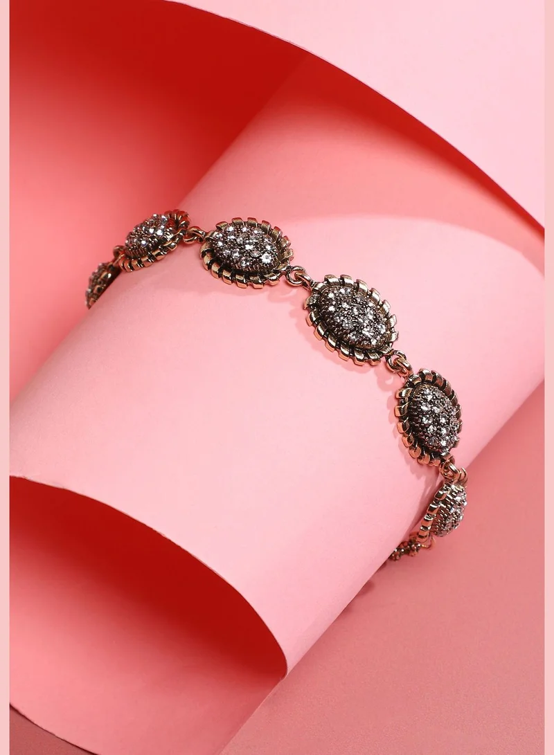 SOHI Gold Plated Designer Stone Party Wear Bracelet For Women