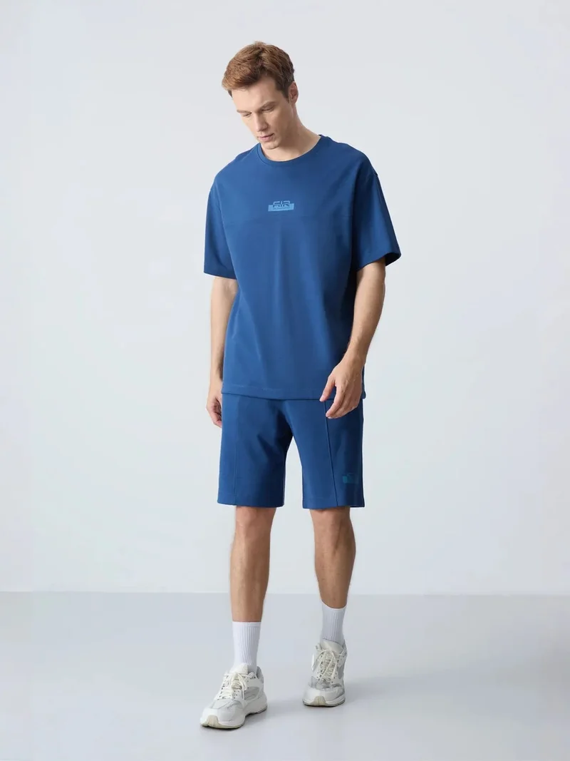 تومي لايف TOMMY Men's Oversized T-Shirt And Shorts Set