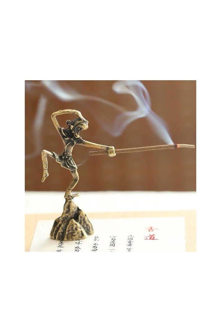 "An elegant and luxurious metal incense burner with artistic engravings.  "  - Image 2