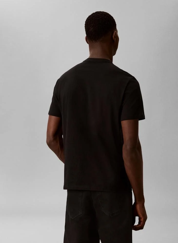 Calvin Klein Jeans Black Logo Graphic Crew Neck T-Shirt for Men | Best Price UAE