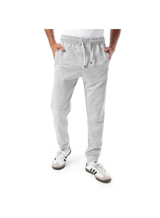 Caesar Men's athletic-style trousers with side pockets. - Image 1