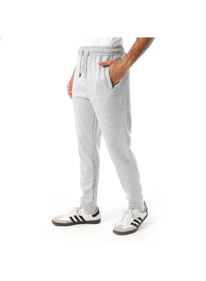 Caesar Men's athletic-style trousers with side pockets. - Image 2