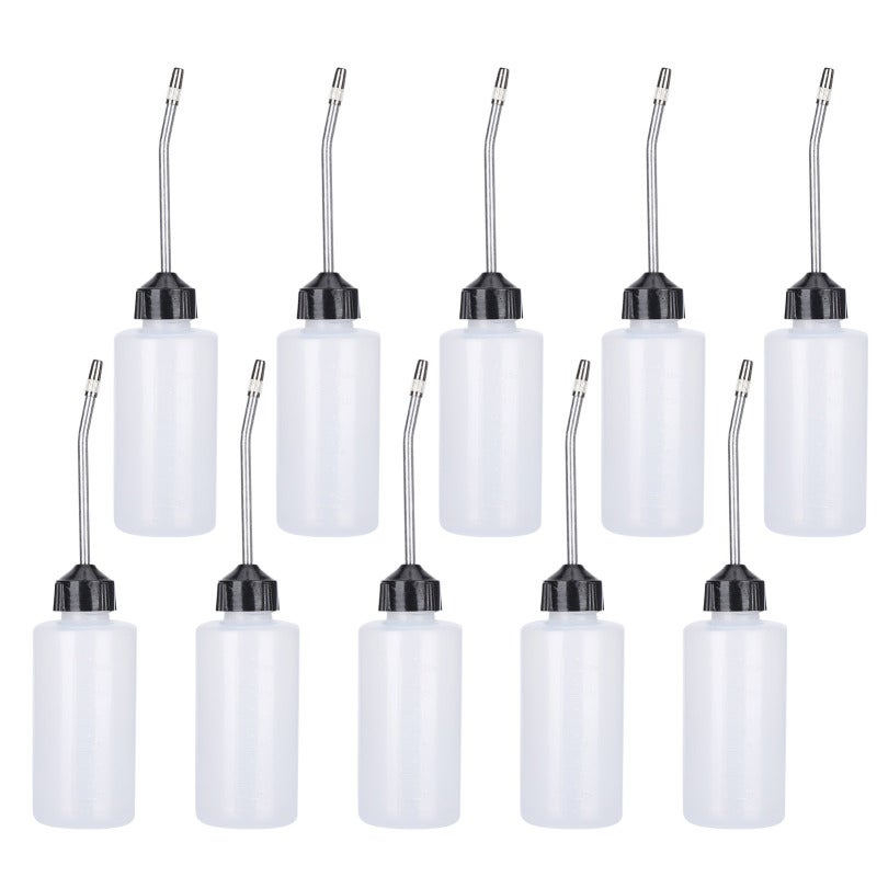 Sewing Machine Oiler: Plastic Oil Pot With Unique Anti-Blockage Pipeline - Quick-Fill Sealing Valve, Oil-Resistant Structure for Sewing Machine Maintenance & Machinery Factories - Image 1
