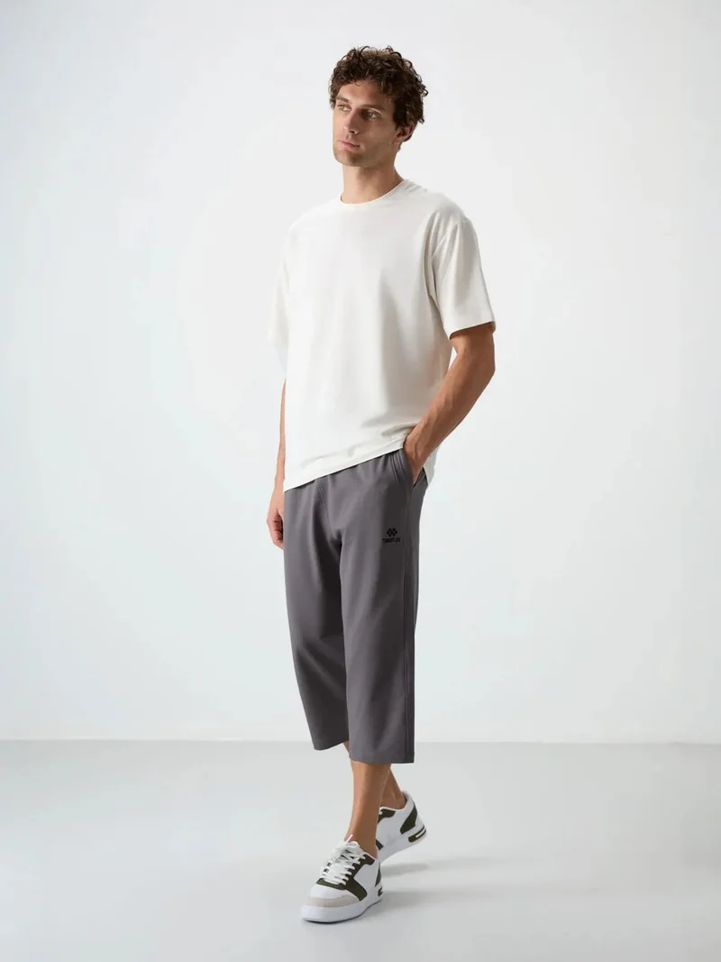 تومي لايف TOMMY Men's Jersey Capri Shorts