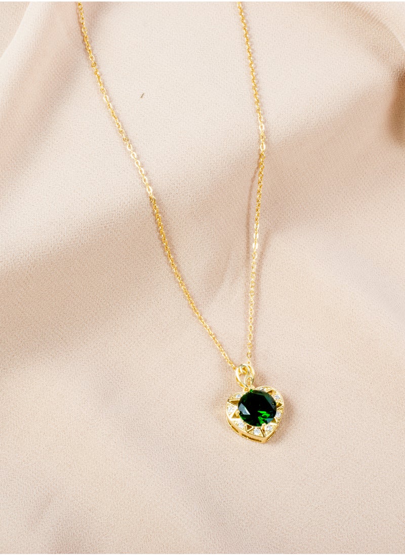 The Black Pearl Accessories - Stainless Steel necklace with a zirconic green crystal heart - Image 1