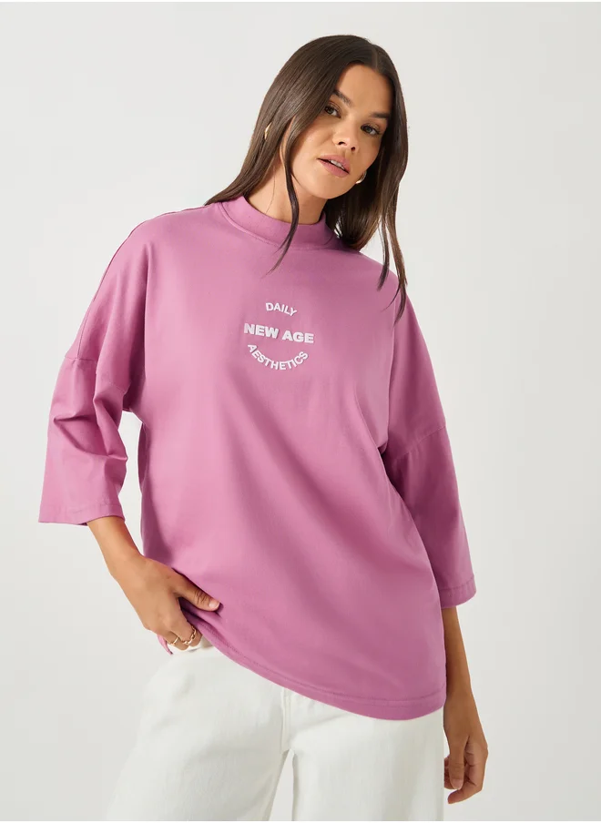 Styli Styli Slogan Printed High Neck Oversized T-Shirt
