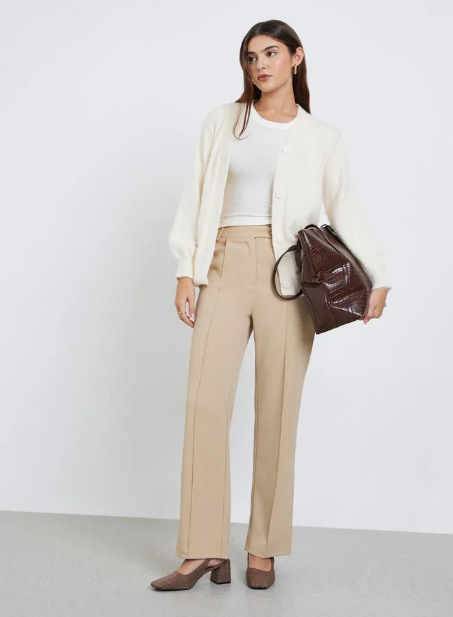 ستايلي كارديجان بقصة عادية مع تفاصيل فرو بنسيج يارن