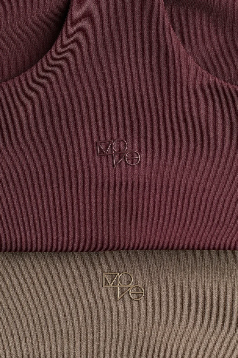 اتش اند ام حمالة صدر رياضية بدعم متوسط - عبوة قطعتين