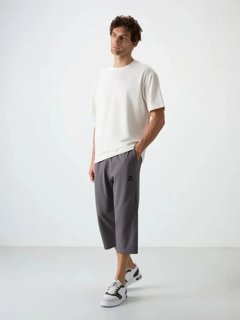 تومي لايف TOMMY Men's Mid-waist Wide-leg Capri Shorts
