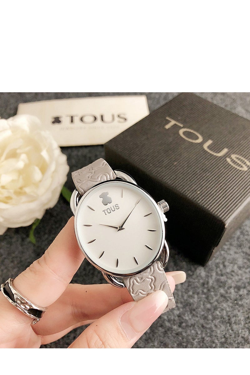 ساعة توز ذات الحزام الرمادي الفاتح المنقوش: قرص بيضاوي مزين بالفضة