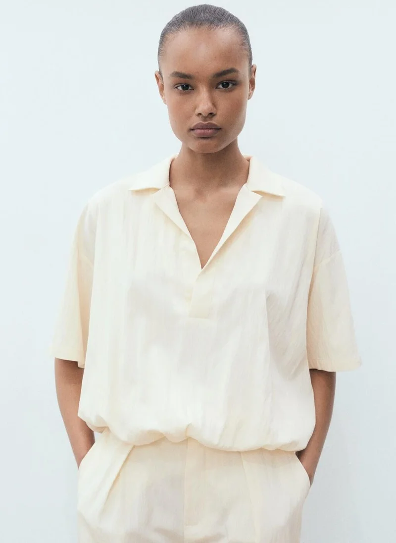 مانجو قميص بيبر-إتش بأزرار