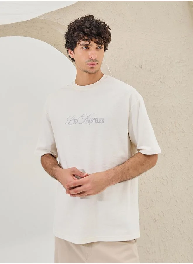 Styli Slogan Embroidered Dropped Shoulder Oversized T-Shirt