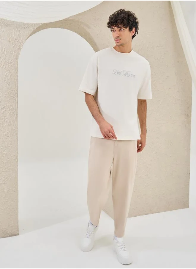 Styli Slogan Embroidered Dropped Shoulder Oversized T-Shirt