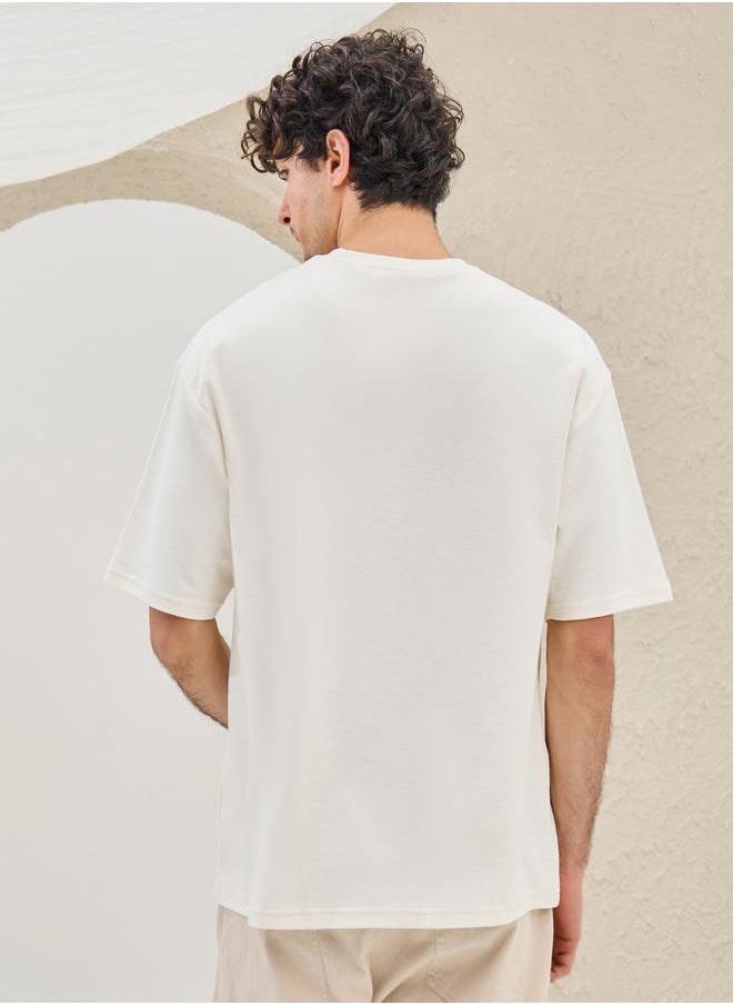Styli Slogan Embroidered Dropped Shoulder Oversized T-Shirt  - Image 4