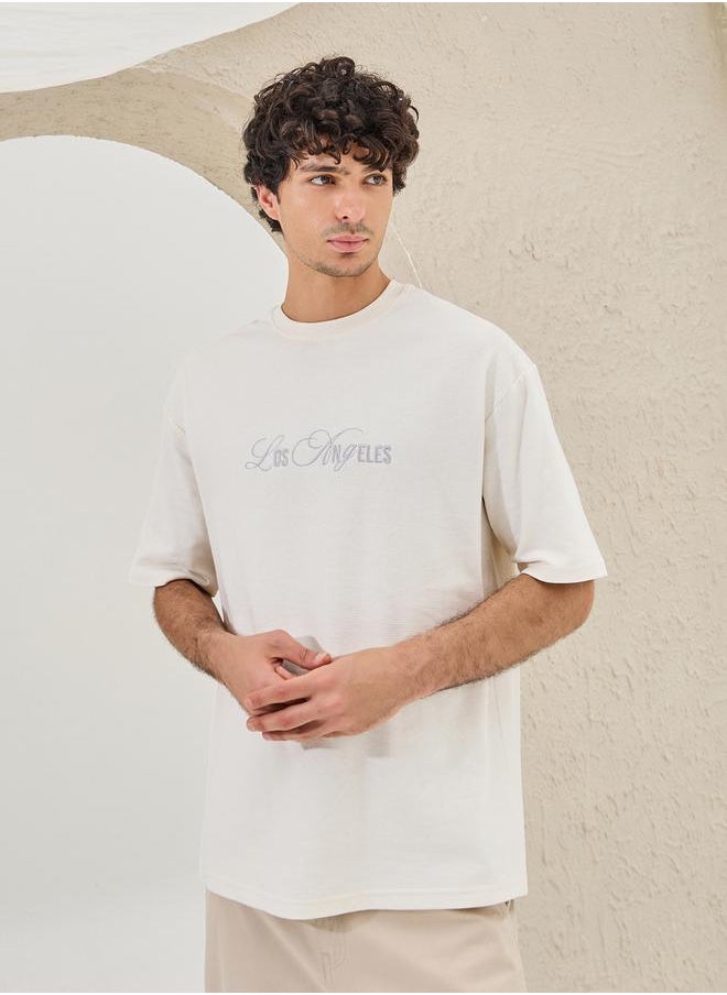 Styli Slogan Embroidered Dropped Shoulder Oversized T-Shirt  - Image 1