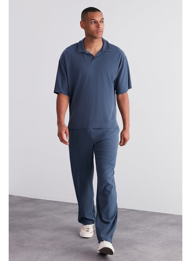 trendyol Indigo Limited Edition Oversize Textured Anti-Wrinkle Ottoman Polo Neck T-Shirt TMNSS23PO00020 - Image 1