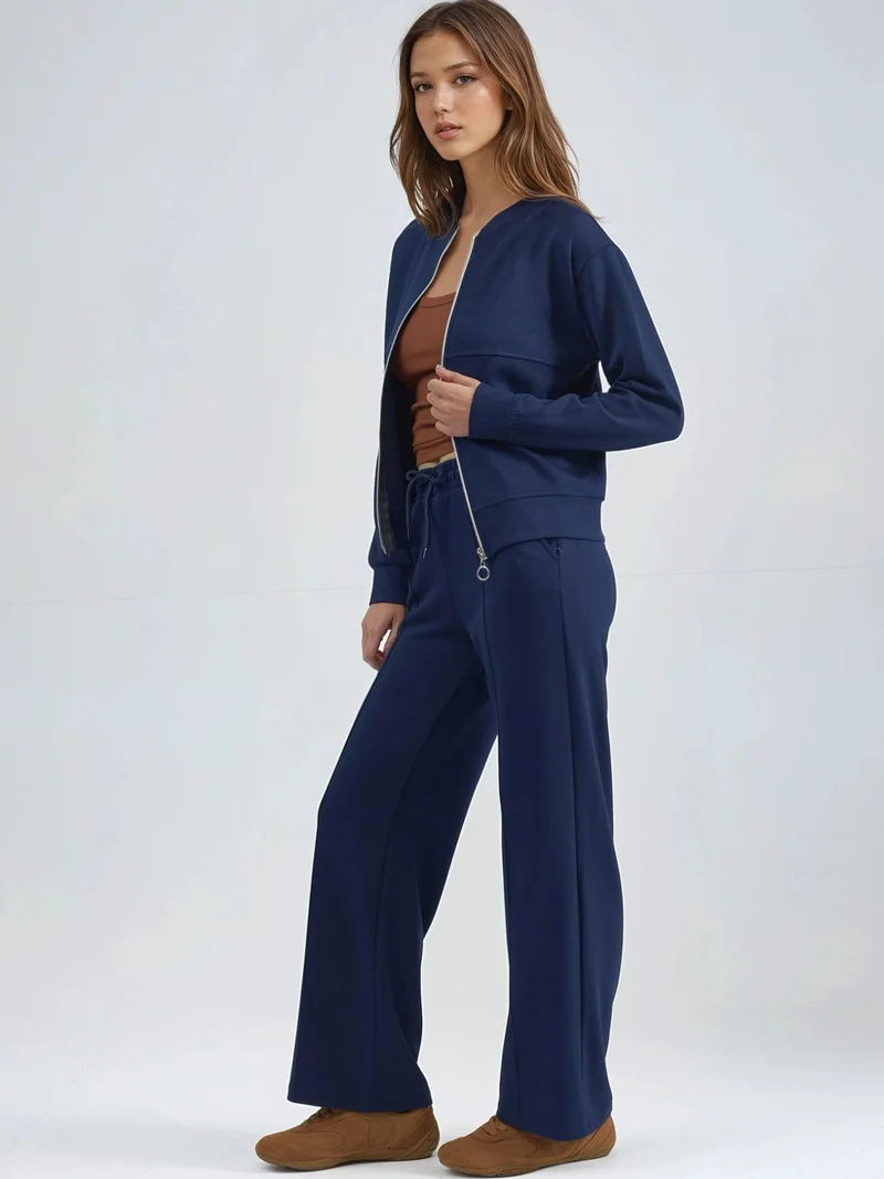 زوبعة طقم رياضي بسحاب من مودال وبنطلون مضلع من مجموعة بيرسان