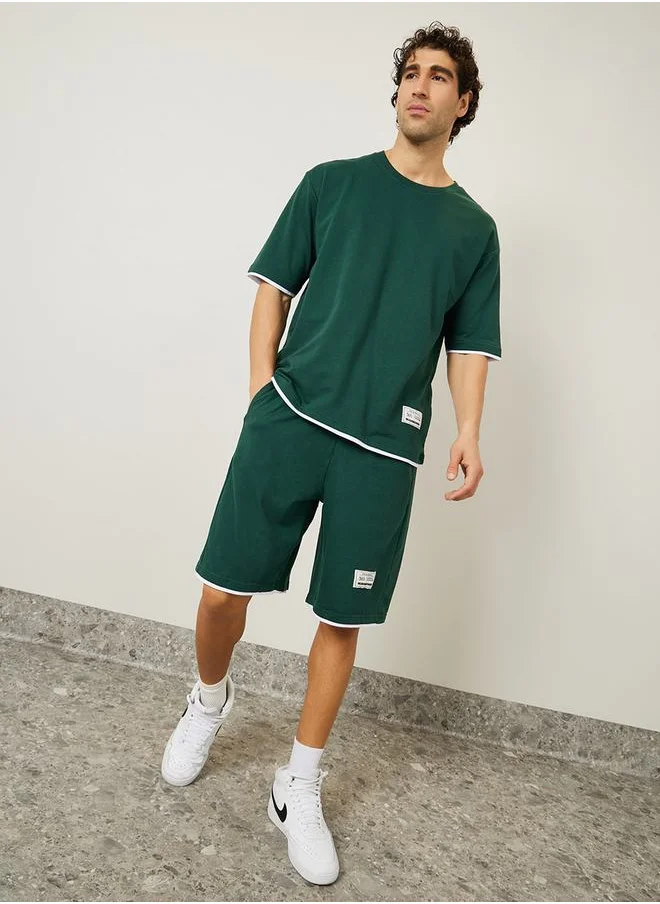 ستايلي Oversized Contrast Trim Terry T-Shirt & Shorts Co-Ords