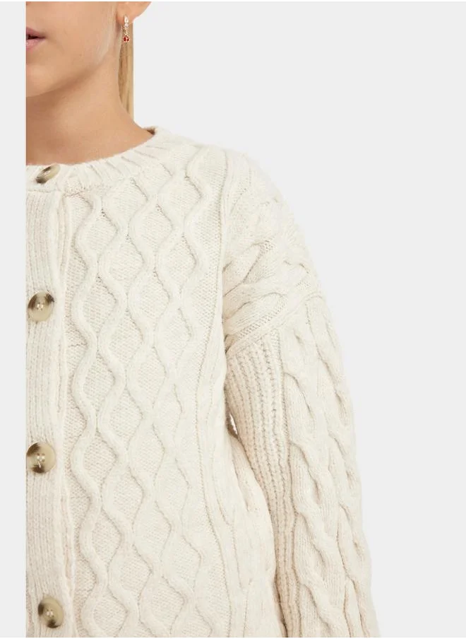 ديفاكتو Textured Round Neck Button Up Cardigan by Styli