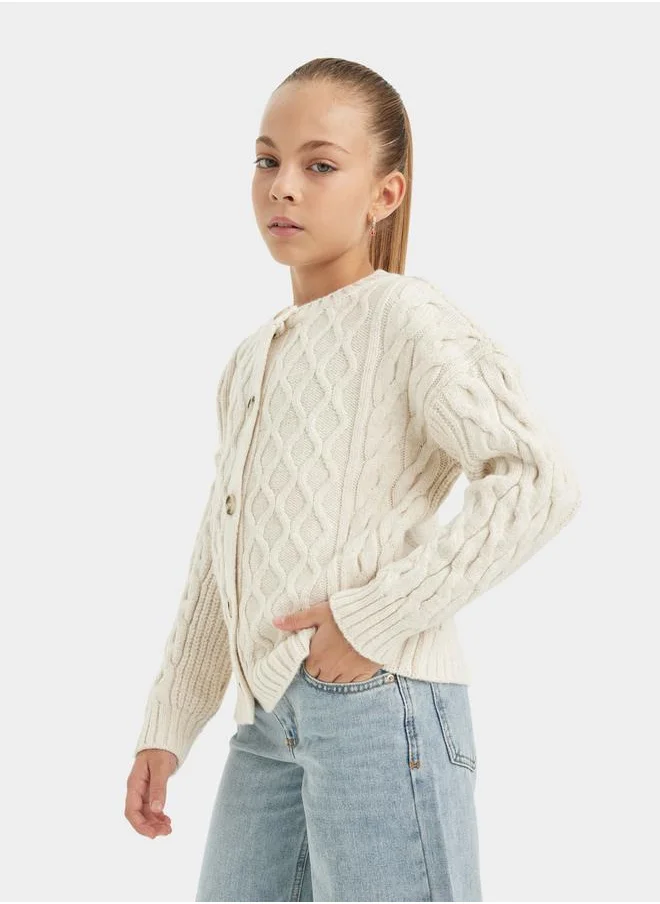 ديفاكتو Textured Round Neck Button Up Cardigan by Styli