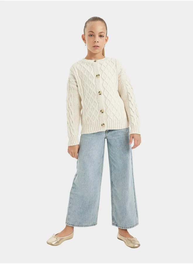 ديفاكتو Textured Round Neck Button Up Cardigan by Styli