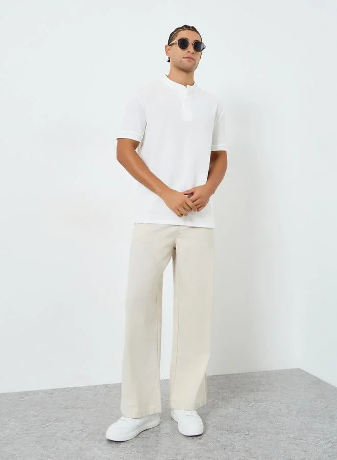 ستايلي بولو بقصة مريحة وياقة باند