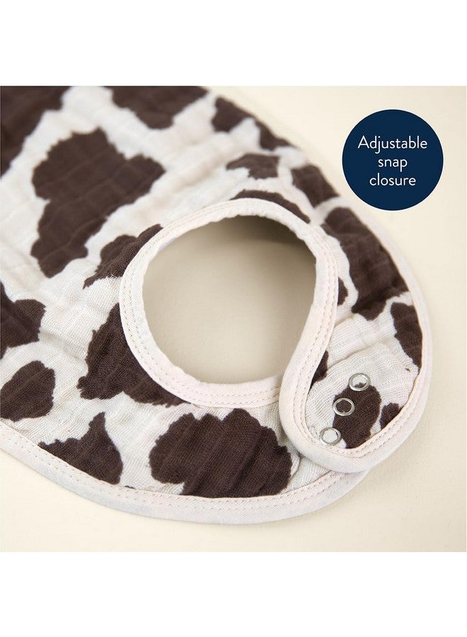 إيتزي ريتزي مجموعة من 3 مرايل أطفال من Itzy Ritzy - مرايل فائقة النعومة وقابلة للتعديل للأطفال الرضع والأطفال الصغار مصنوعة من قماش موسلين قطني ثلاثي الطبقات، مثالية للعاب والتسنين والأكل - 3 طبعات أنيقة ومتناسقة (طبعة بقرة) - Image 3