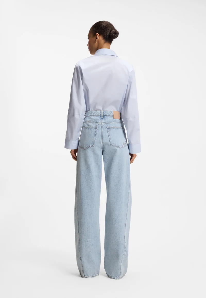 بوس High-rise wide-leg jeans in marble peachy denim