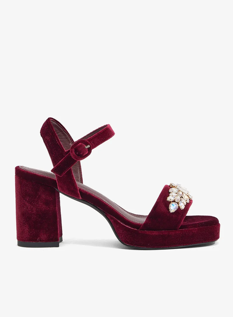 Burgundy velvet platform sandal with ankle strap and crystal embellishment