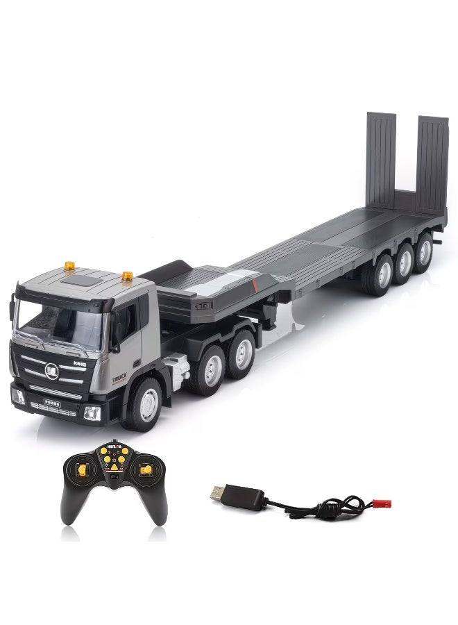 هوينا شاحنة نقل مسطحة (Flatbed) تعمل بالتحكم عن بُعد بمقياس 1:24، مزودة بـ 9 قنوات وتقنية تحكم 2.4 جيجاهرتز، وتتميز بحجم كبير (84 سم) ومصابيح LED واقعية؛ لعبة شاحنة نقل معدات إنشائية قابلة لإعادة الشحن ومناسبة للأطفال. - Image 1