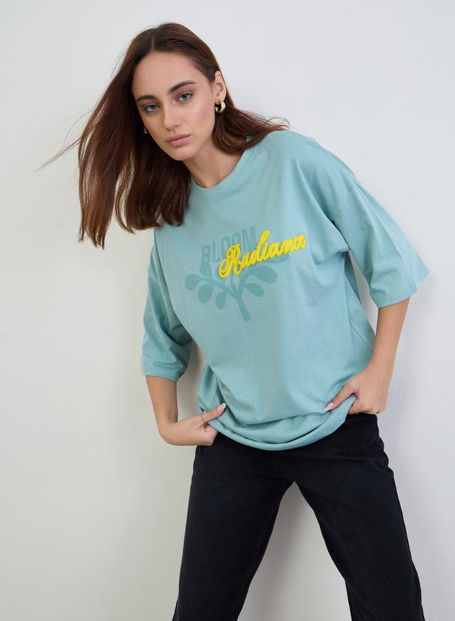 Styli Women Blue Typography Print Oversized T-Shirt with Boucle Embroidery - Image 1
